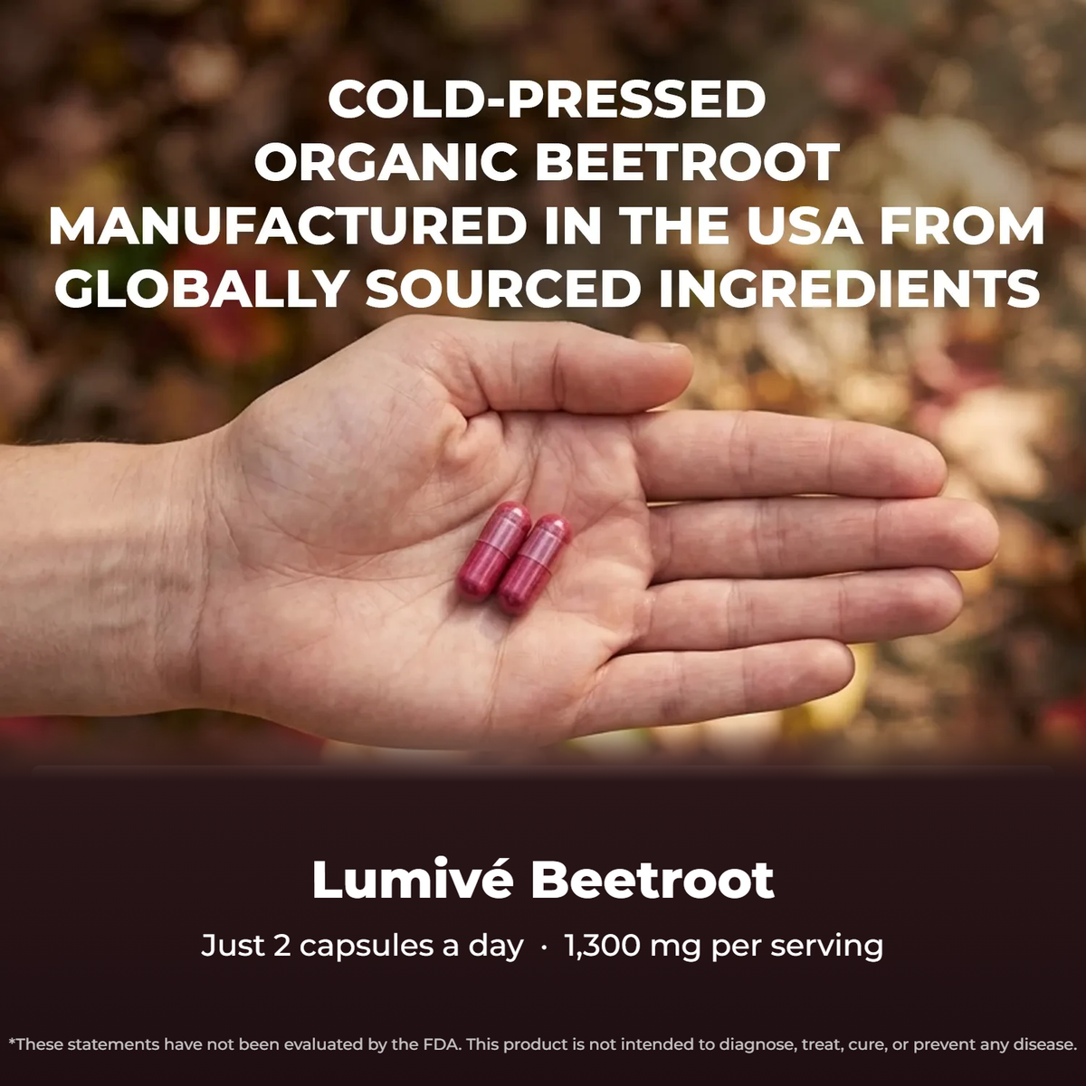Two Lumivé Beetroot capsules in an open hand